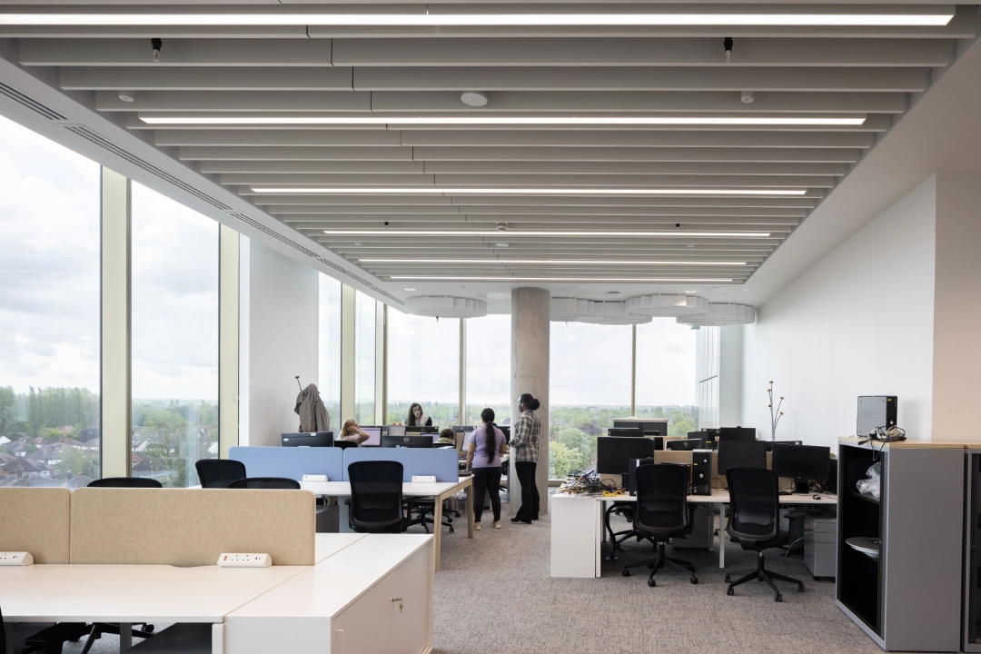 Colleagues in discussion in an office