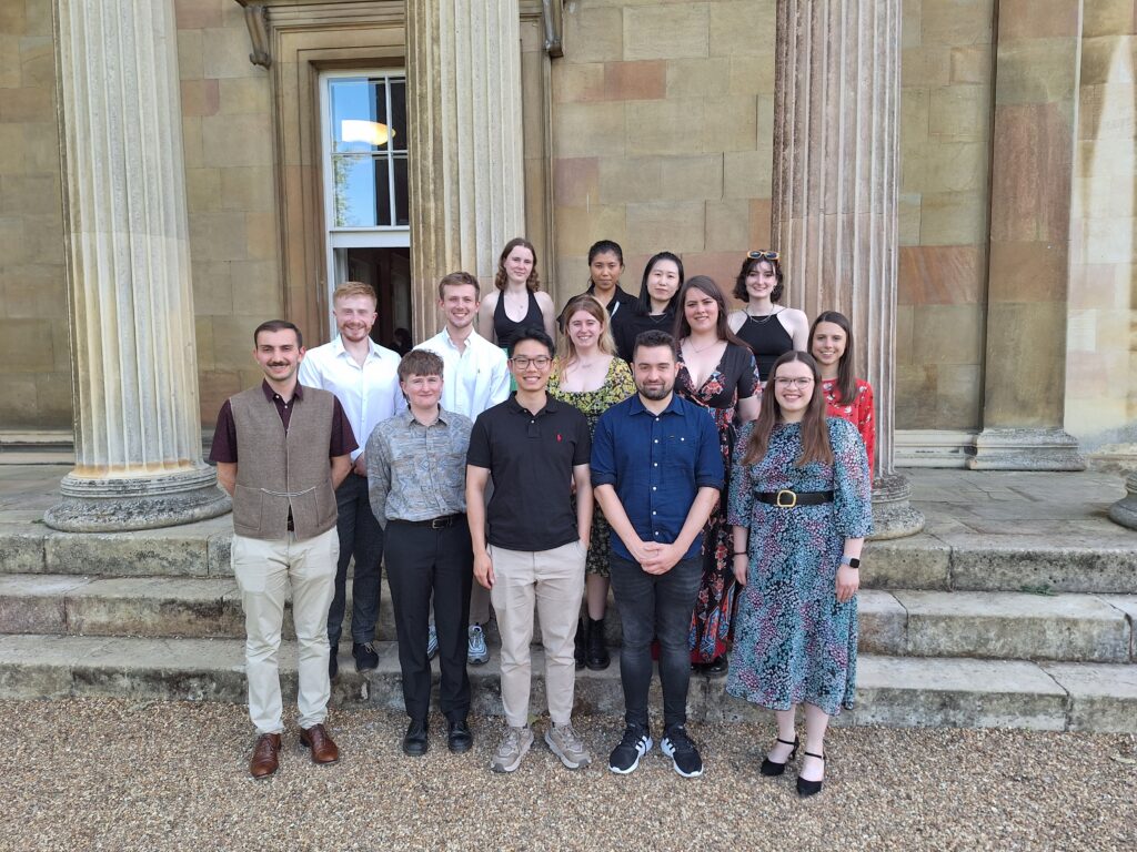 Group photo of CRUK MI students participating in the IPSCC 2023 conference