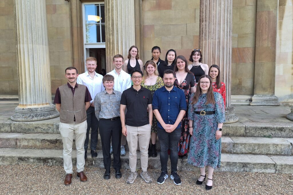 Group photo of CRUK MI students participating in the IPSCC 2023 conference